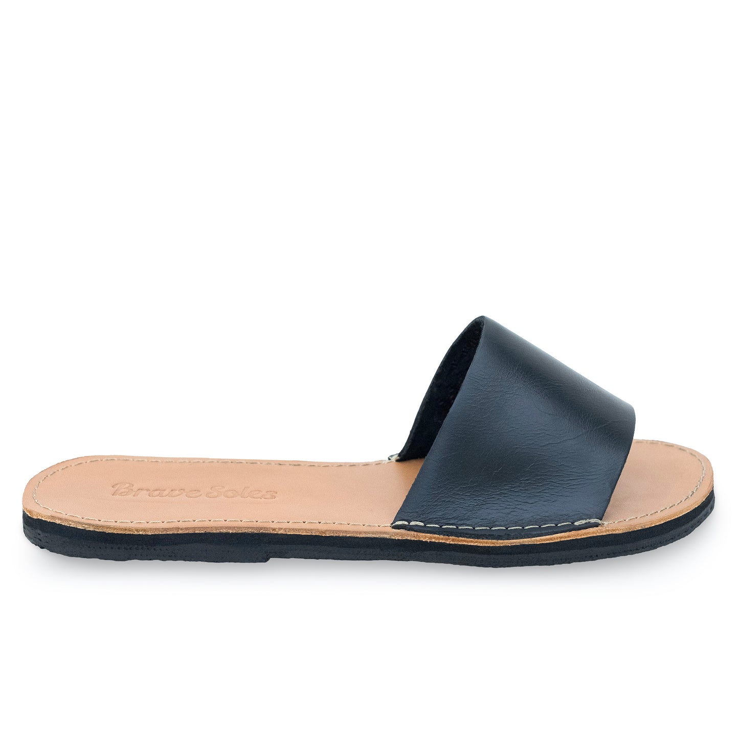 The Miina Caramel Linda Slide: Chic caramel leather slide with cushy sole, ideal for casual days and evening outings.