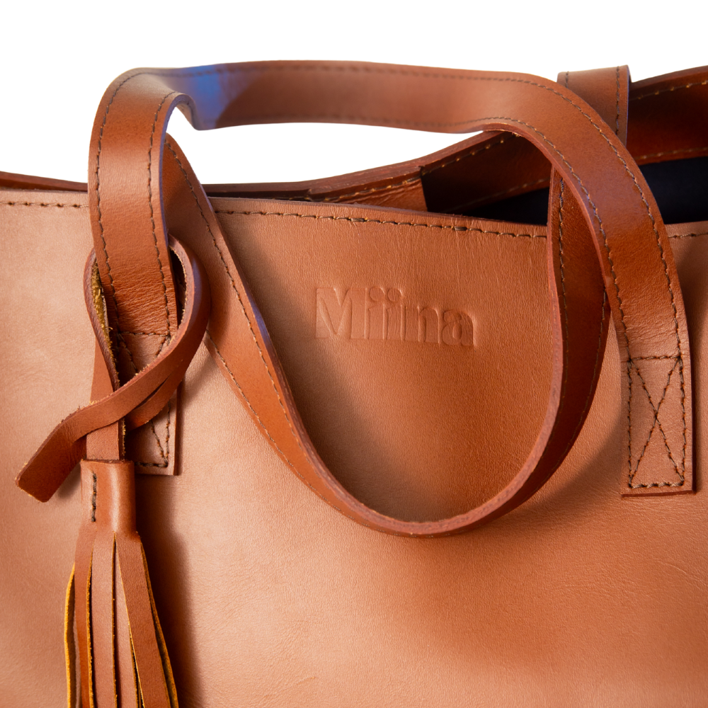 Christal leather tote front view in caramel colour and close up on white background