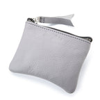 The dinero Grey upcycled Airplane Leather Pouch on white background