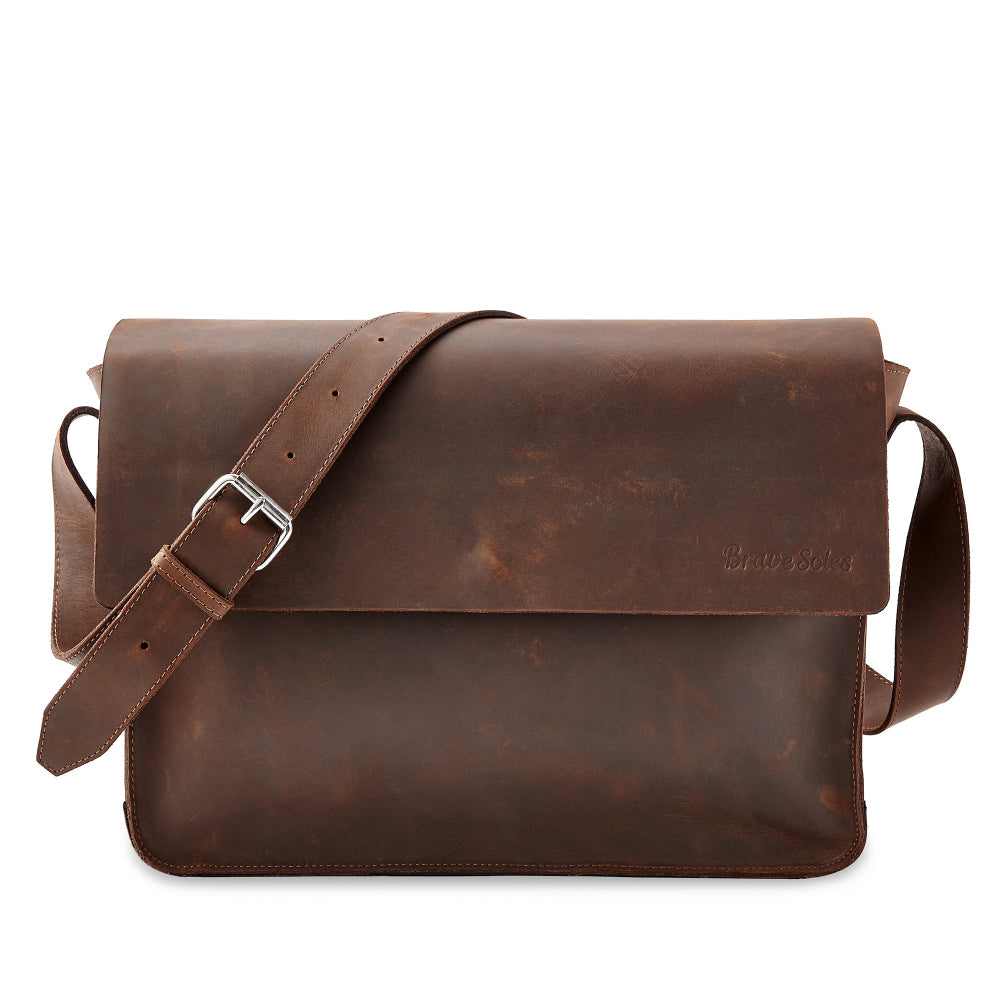 Gabriel leather messenger bag with a strap on a white background