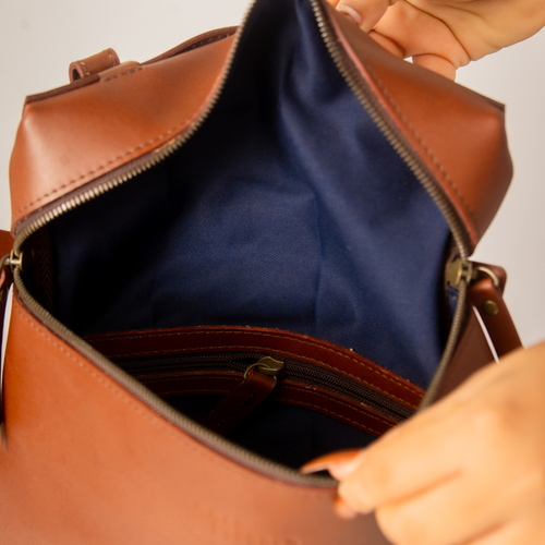 Miina Goods Leather Mochila backpack on white background with interior view