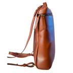 Miina Goods Leather Mochila backpack on white background with sideview
