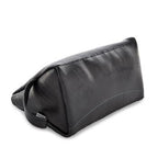 Miina Goods Montaña leather toiletry bag in black  leather showing the upcycled tire bottom 