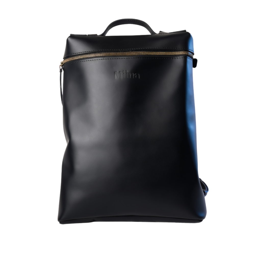 Miina Goods Leather Mochila backpack in sleek black on white background with front view