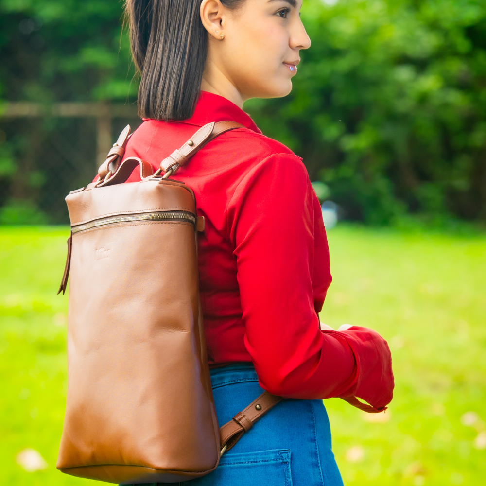 Miina Goods Leather Mochila backpack in cognac colour on model